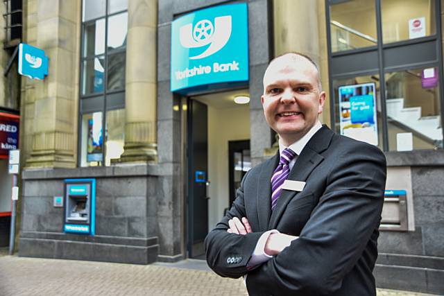 Yorkshire Bank Branch Manager Daniel Cropper outside the newly upgraded branch