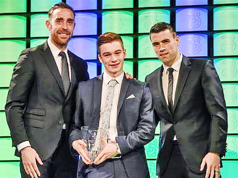 Connor Ronan presented with his award by Republic of Ireland Internationals Seamus Coleman and Richard Keogh