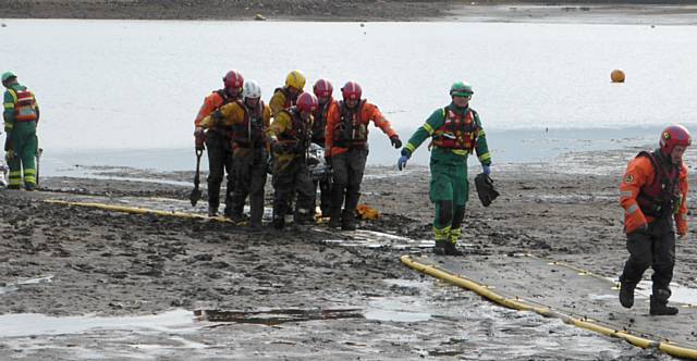 Heywood Firefighters water rescue unit rescues teenager stuck knee-deep mud