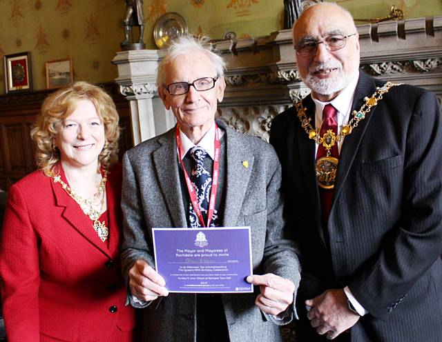 Alan Wilson from Rochdale is presented with his invitation to the Queen’s 90th Birthday Celebration by the Mayor and Mayoress