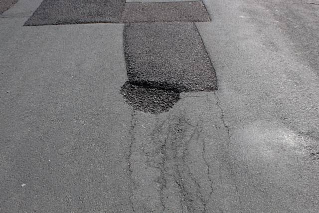 Pot holes and cracks appearing in the roads in Milnrow