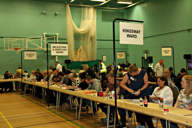 The counters start by verifying the postal votes 