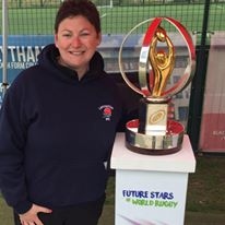 Kate Bennetta, Littleborough Rugby Club's youth director, with the U20s world cup trophy