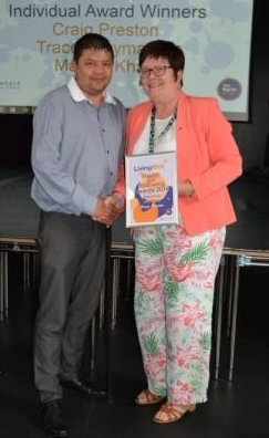 Craig Preston presented with his award by Councillor Janet Emsley