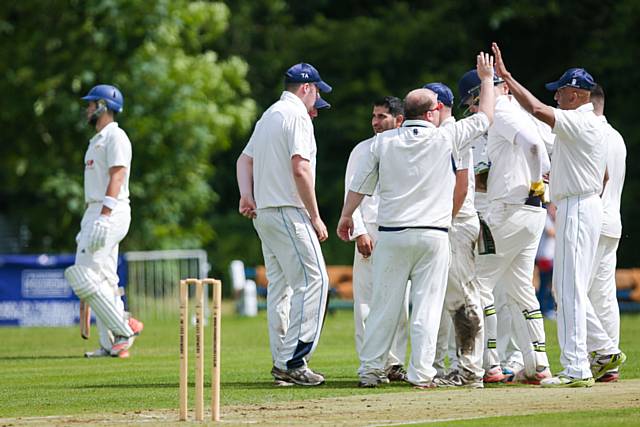 Littleborough Joe Smith-Butler is out with a LBW, Rochdale celebrate