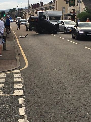 Car overturned  on Rochdale Road