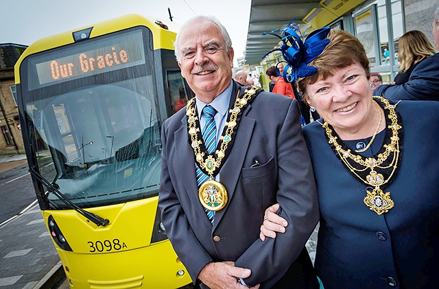 Mayor and Mayoress, Ray and Elaine Dutton get ready to board the Gracie tram