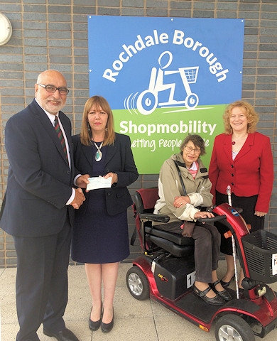 Former Mayor, Councillor Surinder Biant, Michelle Hollinrake, Manager of Shopmobility, Chris Berry, Service user and former Mayoress, Councillor Cecile Biant