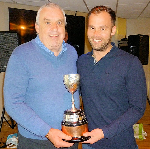 Norden Cricket Club Chairman John Murphy presents the Coupe Cup to Clubman of the year Phil Docker
