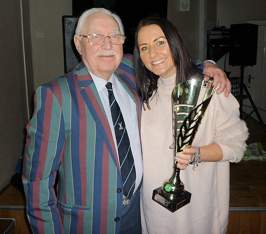 Norden Cricket Club President Brian Butterworth presents the trophy named in his honour to Dee Hodgkinson