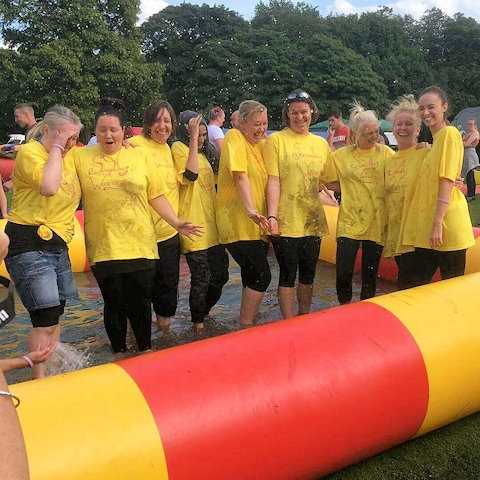Members of fostering team after completing their It's a Knockout challenge 