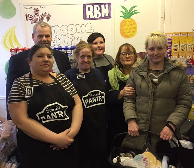 Local councillors Richard Farnell and Kathleen Nickson join local Pantry volunteers and shopper Makala Mitchell at the opening day of the Kirkholt Pantry