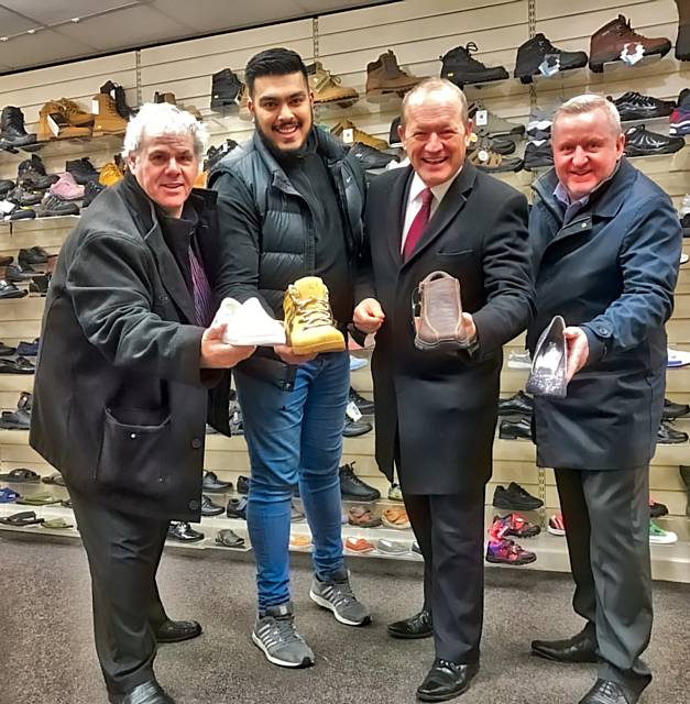 Council Leader Richard Farnell, shop owner Ali Hassan, Simon Danczuk MP and town centre manager Mark Foxley