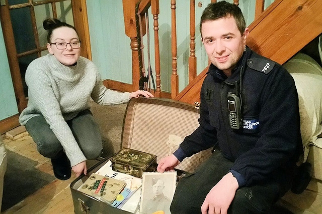 Shauna Hamer-Pieper and PCSO Chris Hamer with the missing photographs