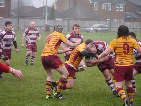 Rochdale RUFC Captain Callaghan takes the hit