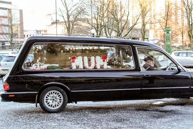 Funeral cortege of former Mayoress Elaine Dutton pauses outside Rochdale Town Hall