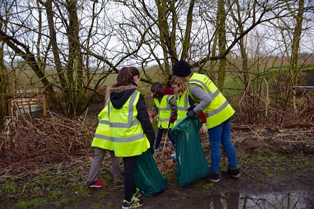 Rainbows, Brownies, Guides clean up Queen’s Park 