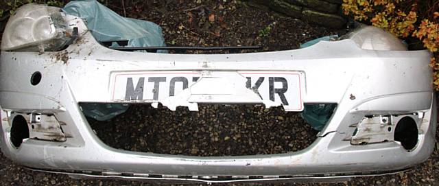 Vauxhall Corsa front bumper dumped in Ashwoth Valley