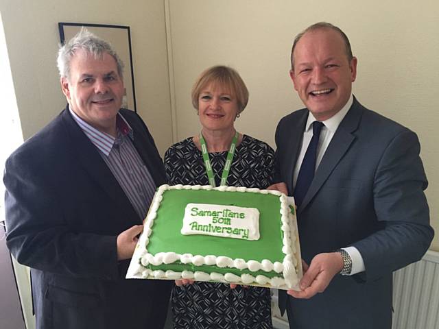 Councillor Richard Farnell, Samaritans branch Director Janet Murphy and Simon Danczuk celebrate 50 years of the Samaritans