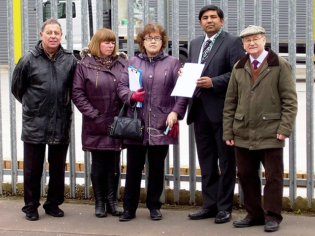 Residents hand the petition to Councillor Aasim Rashid and Councillor Billy Sheerin