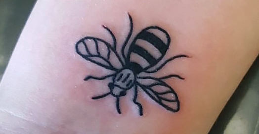 Bee tattoo by 21st Century Tattoo