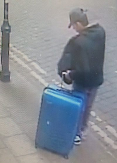 Salman Abedi carrying a distinctive blue suitcase