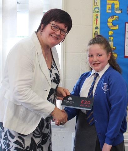 Councillor Janet Emsley with prize winner Sarah Pugh of Parkfield Primary School, Middleton