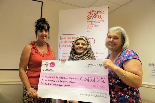 Home-Start Managers Donna McKenna (Rochdale), Razia Mohammed (Bolton) and Kate Brookes (Bury) were presented with over £343,000 in Lottery funding