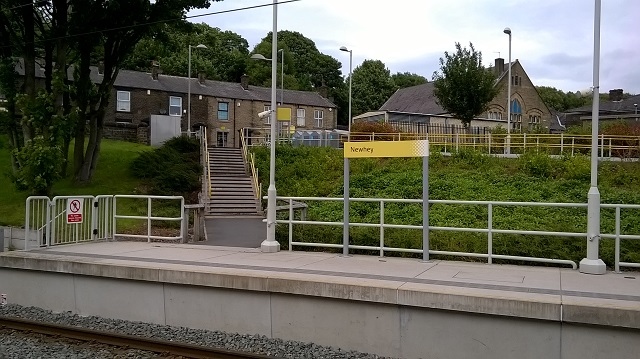 The crossing point to use the ticket machine on the other side of the station over the bridge (Manchester side)