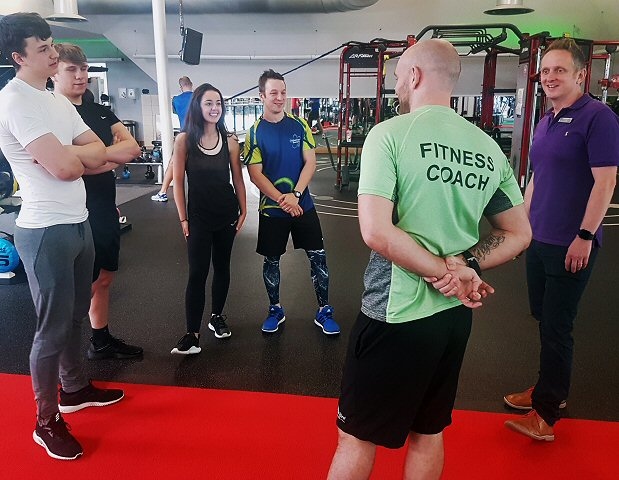 Shannon Wilson and other Hopwood Hall students meet with Jake French and David Lloyd Fitness Coaches