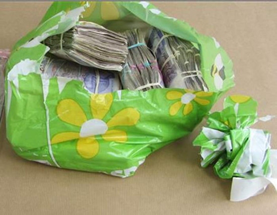 Police seized over £160,000 in cash from Abid Hussain and Mariam Akhtar's flat in Rochdale