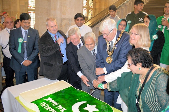 The cake-cutting ceremony in the Town Hall after the Pakistani flag was raised