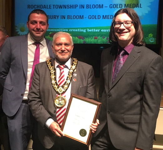Accepting the gold for Rochdale