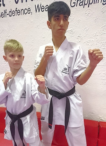 Daniel Tarasevic and Huseyn Mikayilov gain their Black Belts in Karate