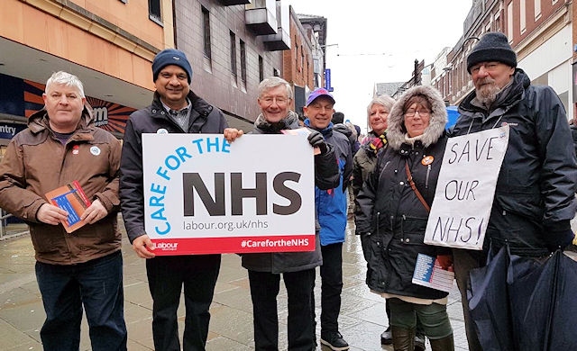 Rochdale MP Tony Lloyd and Labour Party members show their support for the NHS