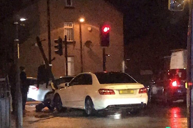 A traffic light was damaged during the collision