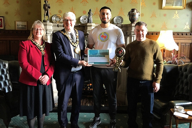 Mehran Khan with the Mayor and Mayoress, Ian and Christine Duckworth, and boxing coach Steven Connellan