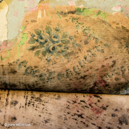 The volunteers discovered some wallpaper that may well date back for about 200 years