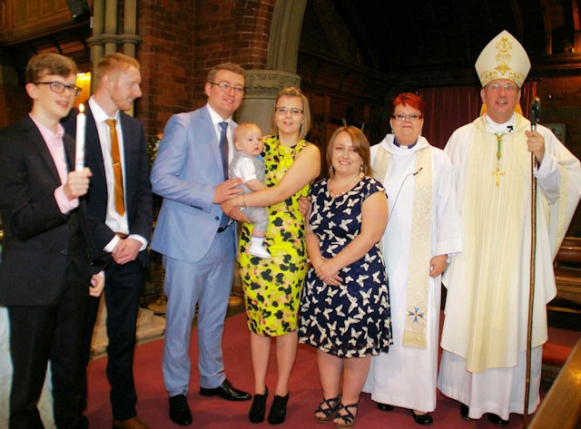Baby Ethan, parents and Godparents with proud grandmother, the Rev Rachel, and Bishop Mark