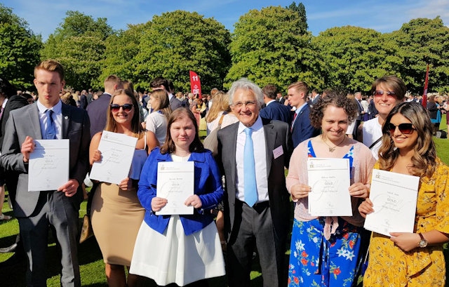 Young people receive their Gold Duke of Edinburgh Award from John Suchet