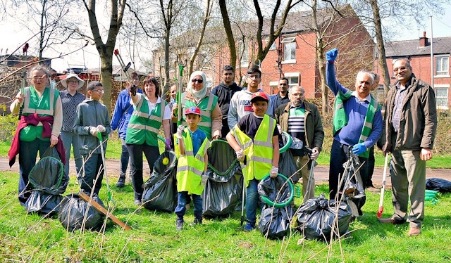 Volunteers from Rochdale Environmental Action Group, the Flood Action group, the National Flood Forum, Rochdale Council of Mosques and Rochdale Parish Churches