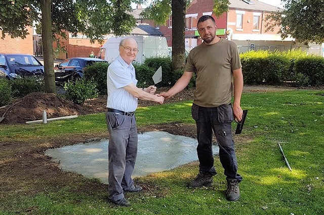 A job well done: Councillor Sheerin and Paul Ellison after the concrete is laid