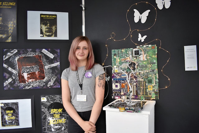Alisha Yates and her Graphic Design project at the Hopwood Hall College End of Year Arts Show