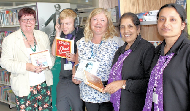 Councillor Janet Emsley (left), cabinet member for libraries, with council library staff