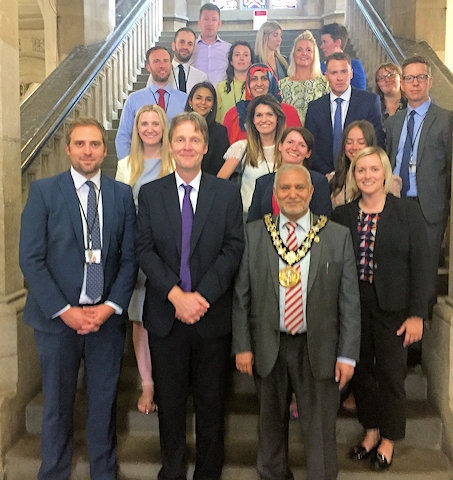 Rochdale Sixth Form College’s new principal, Richard Ronksley, and his colleagues with Mayor Mohammed Zaman