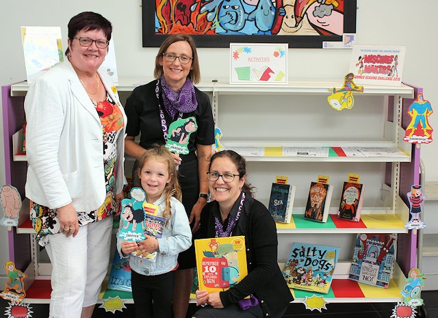 Four-year-old Esme Bond with Councillor Janet Emsley, Joanna Yeomans and Michelle Krauza (both from the council's library service) 
