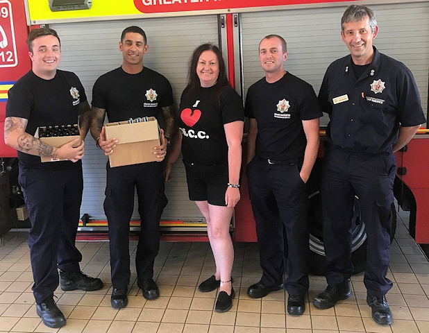 Motorbikers Cosmetic Company's Beki Coxton and Mark Matthews provide much-needed relief to Greater Manchester Fire and Rescue Service