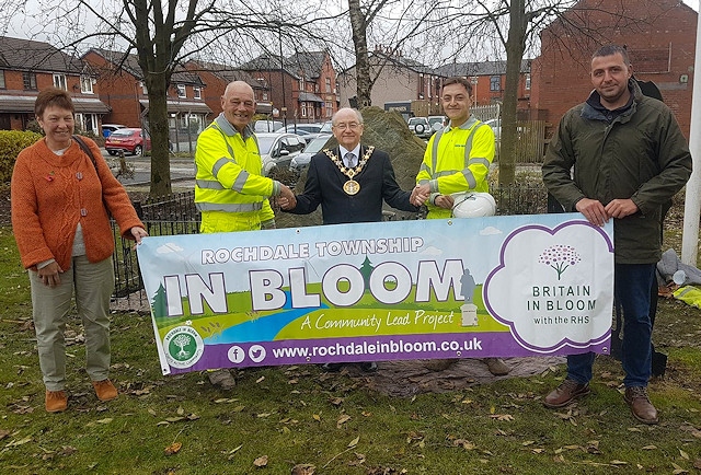 Balfour Beautty with members of Rochdale In Bloom and a banner