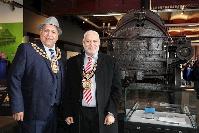Rochdale Mayor Mohammed Zaman (right) and Oldham Mayor Javid Iqbal with Stephenson's Rocket