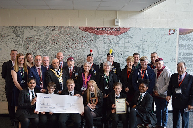 The ceremony was held at the school attended by the Mayor of Rochdale Councillor Zaman, the Deputy Lord Lieutenant, Ian Sandiford, Wing Commander David Forbes, President of the Rochdale Branch of the Legion, Norman Armstrong-Kersh, Chief Executive of Life for a Life, veterans from the Legion and governors of the school